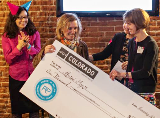 Marni receiving her AIGA Pro Grant check at the AIGA Centenntial Birthday Bash last January.